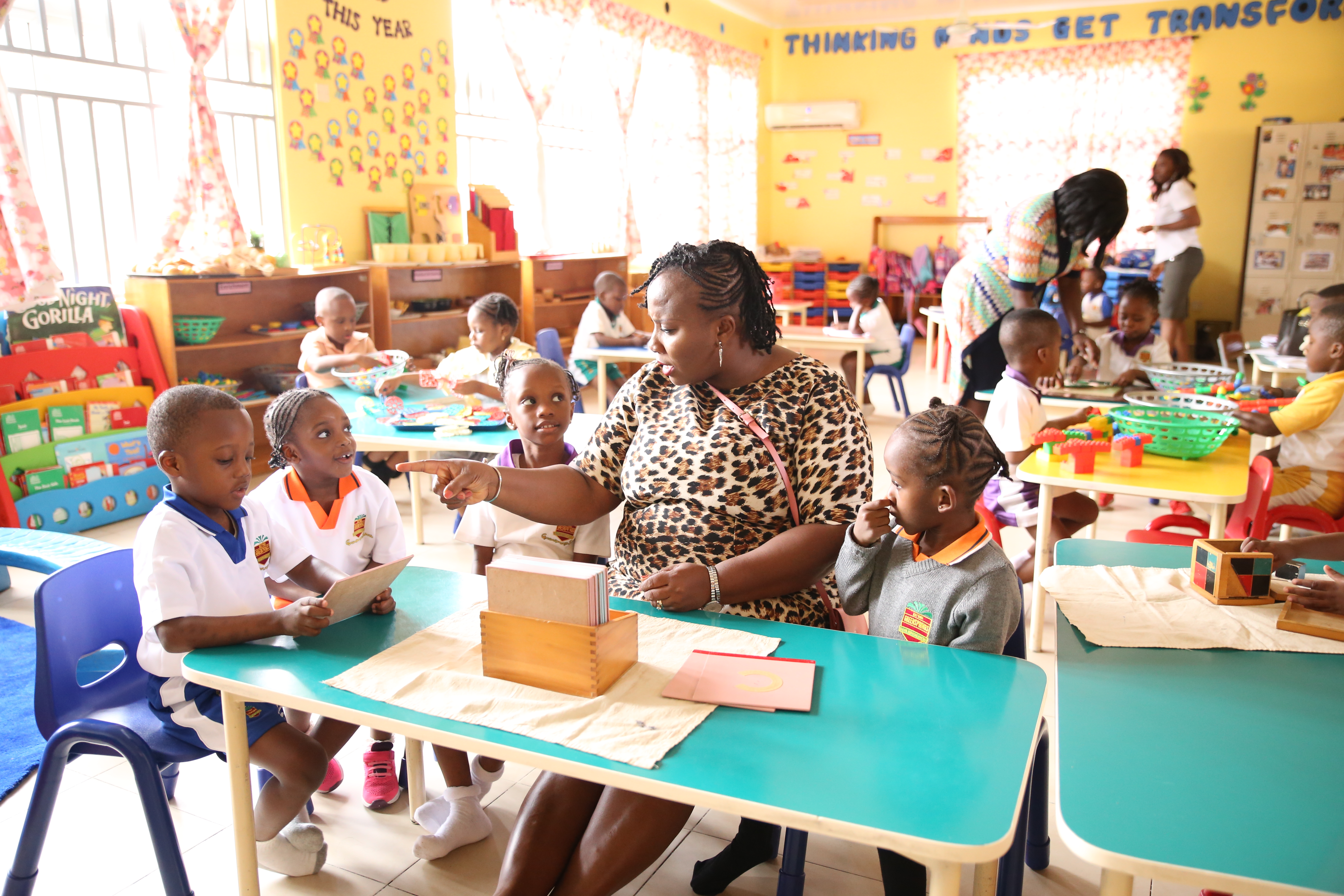 Preschool students and teachers in Greensprings school.