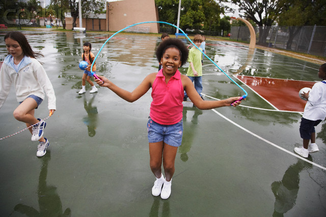 Multi-ethnic children playing in urban area